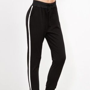 black sweatpants joggers with stripes